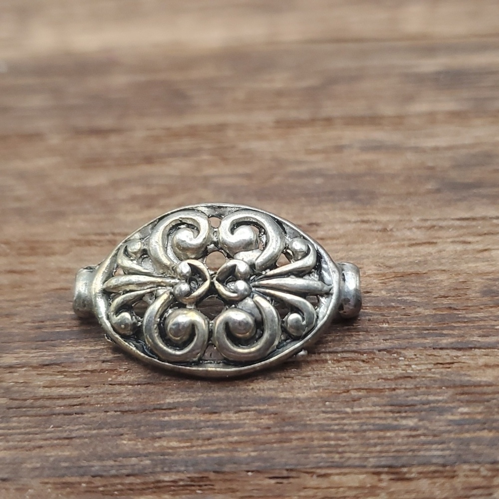 Promenade of fancies lace filigree pendant